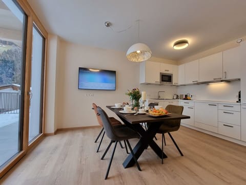 Furniture, Table, Cabinetry, Chair, Wood, Interior Design, Flooring, Countertop, Floor, Living Room