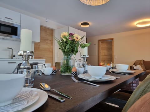 Table, Furniture, Tableware, Flower, Dishware, Building, Textile, Plant, Lighting, Interior Design