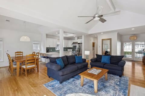 Living room featuring a flatscreen tv and a queen sleeper sofa.
