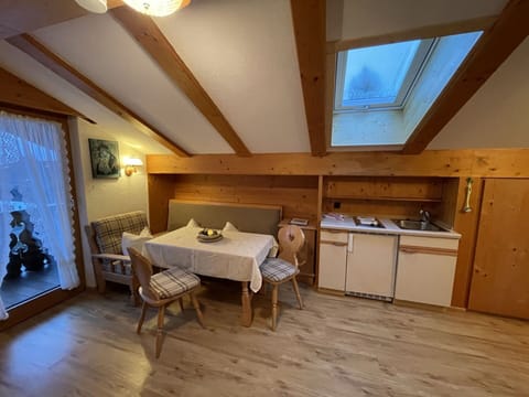 Table, Furniture, Cabinetry, Wood, Chair, Lighting, Window, Building, Interior Design, Flooring