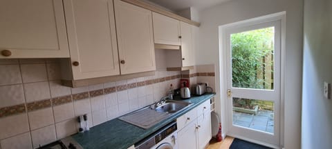 The kitchen and back door.