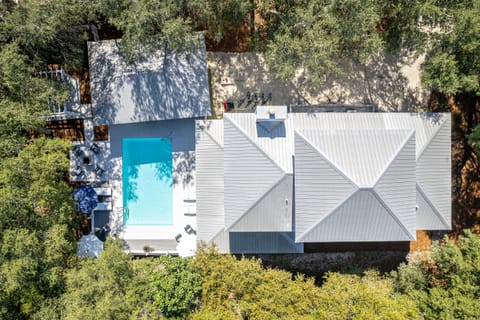 Caught By A Wave is surrounded my many trees making it feel serene and relaxing.