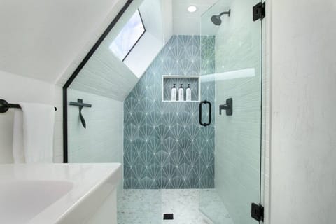 Huge walk-in shower with skylight