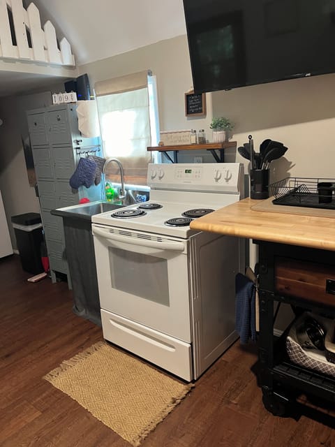 Stove, cooking utensils, pots, and pans