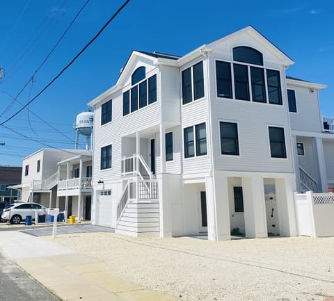 Come from the Beach right to the backyard with outside shower, pool and hot tub