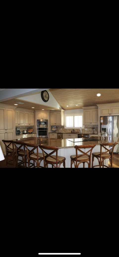 Kitchen with bar seating for 6