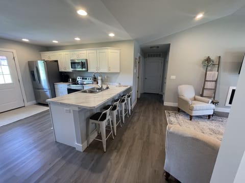 Kitchen and hallway to bedrooms and laundry room.
