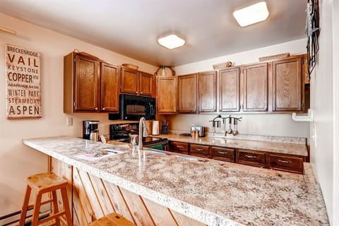 Updated kitchen with bar area