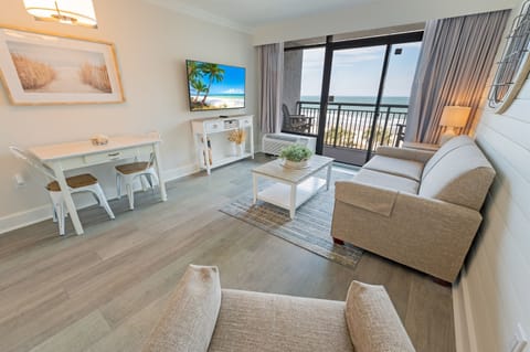 - Relax in a bright, coastal inspired living space with stunning ocean views - Stream your favorite shows, unwind on the comfy sofa, or step out onto the balcony - Open, airy, and designed for total relaxation, your beach retreat starts here