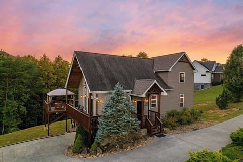 Enjoy stunning sunset views from the spacious deck of your mountain escape!