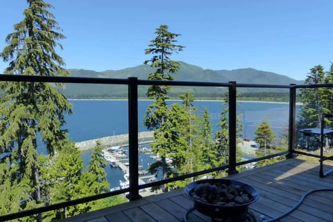 Private balcony with propane fire pit and marina view.