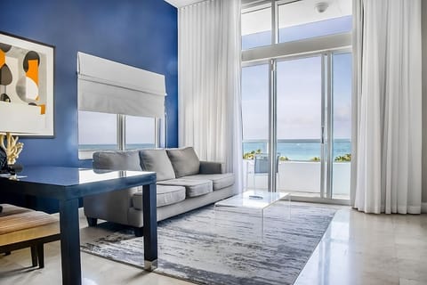 Soak in sweeping ocean views from your airy lounge.