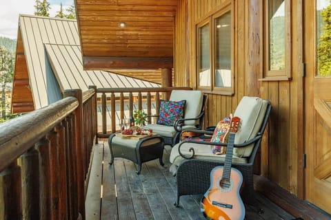 Beautiful upper floor mountain-view balcony with comfortable seating