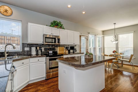 Spacious Kitchen-Complete w/ Bar Seating, Island, and an Eat-In Nook.