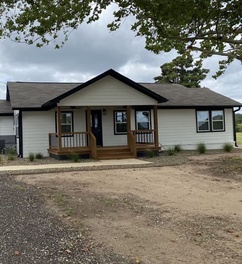 Front view of cottage and main home