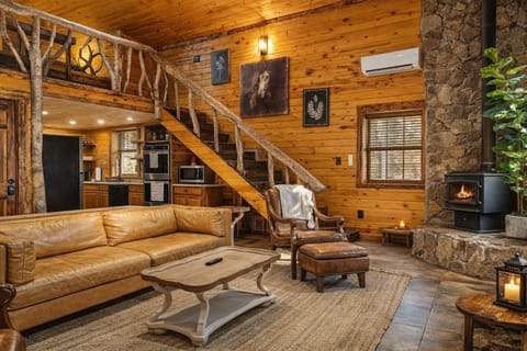 Living room view to Lofts upstairs and into the kitchen