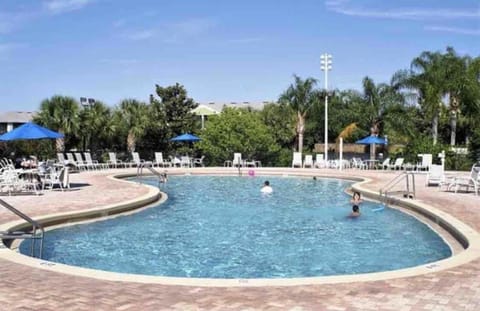 - Resort style pool with palm views perfect for family vacations near beaches and dining
- Large shared swimming pool with loungers umbrellas and sunny relaxation space
- Ideal Myrtle Beach stay with outdoor pool comfort and community amenities  