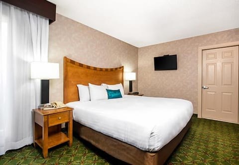 Sink into plush bedding for a quiet, restorative night.