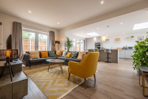 Little Soames, Holt: Stylish open-plan living space which spills out on to an enclosed courtyard garden