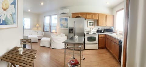 Open floor plan with kitchen and living space