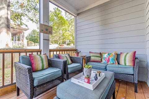 Curl up with coffee in the morning and enjoy the fall weather from your private screened-in porch.