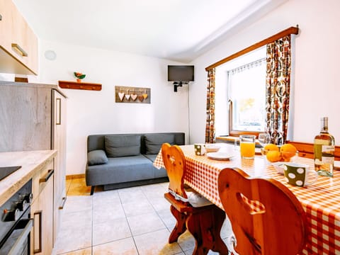 Furniture, Table, Property, Picture Frame, Couch, Orange, Chair, Interior Design, Window, Wood