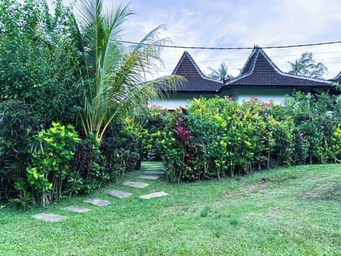 Lush garden offers shade, privacy & a serene, open-air retreat at Ambary Ubud.