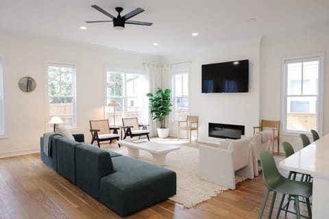 Light-filled living room in an open floor plan.