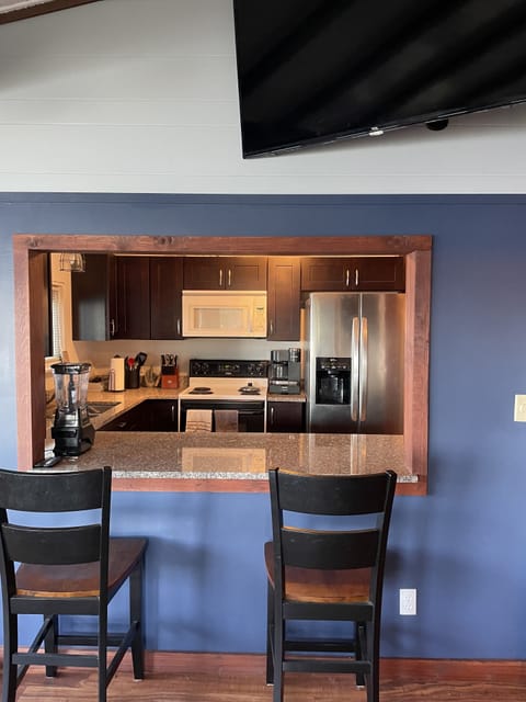 Kitchen- full stocked with dishes, pans, etc