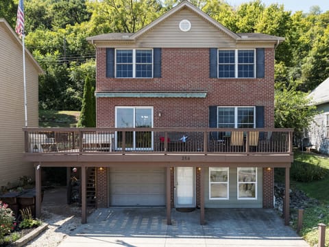 Enjoy a cup of coffee or meal on the front deck with river views