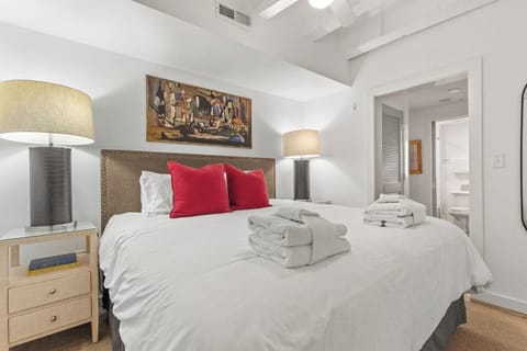 King Bed with access to the closet and bathroom