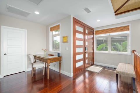 Entryway with large foyer, seating area to remove your shoes and just around the corner a desk area so that you can work remotely if needed.