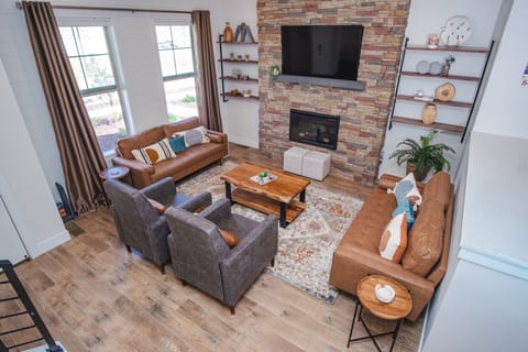 living room with smart tv and electric fireplace