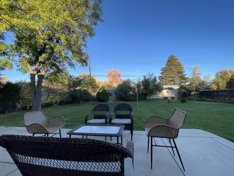 Enjoy the outdoors in the spacious backyard with plenty of outdoor seating