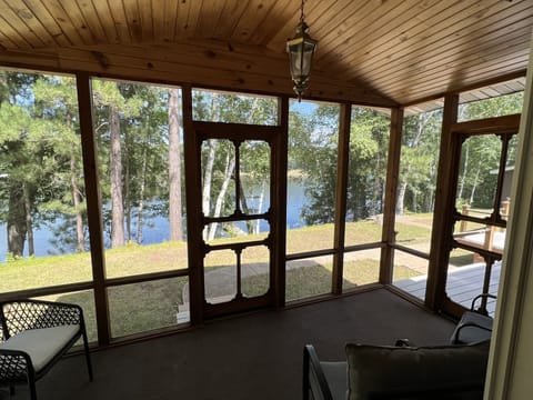 Screened in porch overlooking the lake