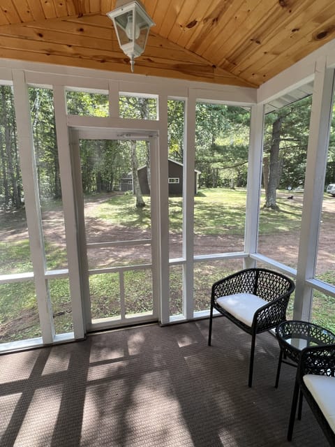 Porch off the master, perfect to relax and watch the deer