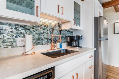 Kitchen is stocked with coffee for your enjoyment.  Also included are dishes, utensils, dish detergent, paper towels, and other needed kitchen items to make your stay as comfortable as possible.