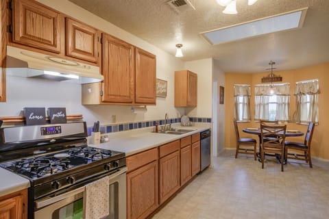 Ample kitchen with additional seating to enjoy morning coffee