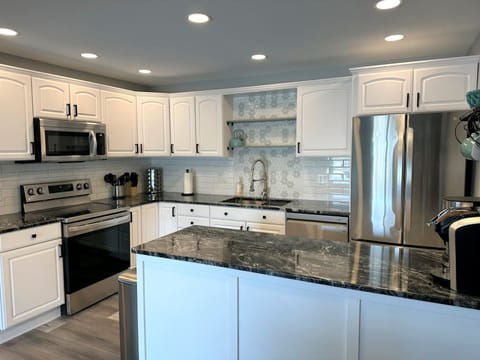 Large, fully stocked kitchen