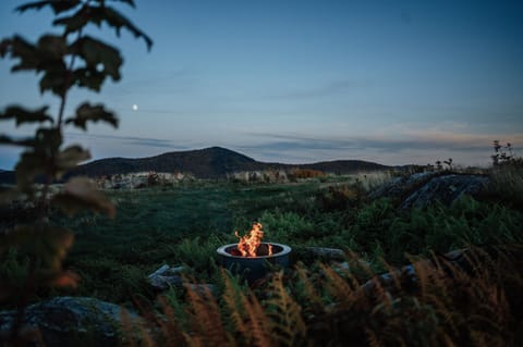 Watch the moon and stars appear on this private mountain top, a site of celebration for the Abenaki people. Breeo fire pit for a cozy fire all evening with an amazing view