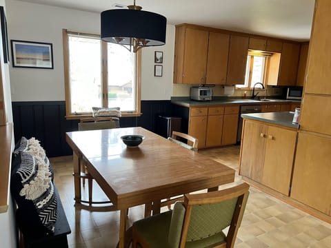 Dining Room with Flexible Seating. Table expands & 2 benches for more seating