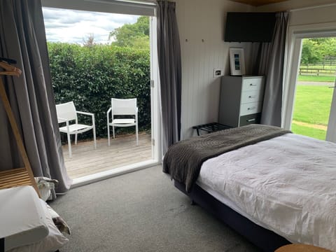 Master bedroom looking out to small decked area