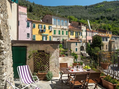 Table, Furniture, Building, Property, Plant, Sky, Window, Chair, Mountain, Outdoor Furniture
