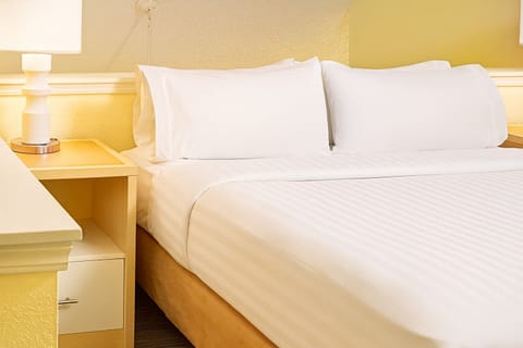 Sink into freshly made sheets for a simple, restful night.