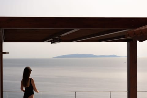 From the balcony you may cherish the Aegean Blue.