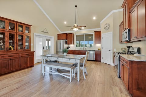 Closer view of the dining table walking toward the kichten.