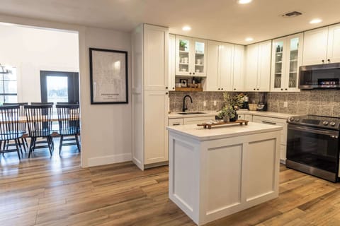 Kitchen with island and coffee amenities