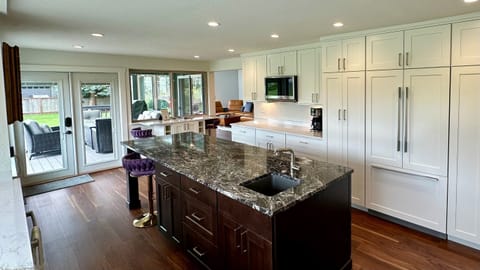 Marble island in kitchen, integrated counter depth fridge