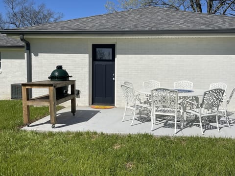Outdoor seating for 6-8 people with Big Green Egg