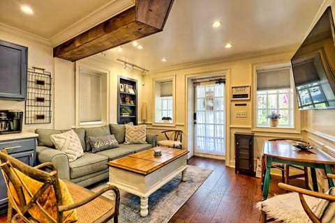 The open living area is perfect for two — a spacious sofa, cozy accent chairs, and a 65” Smart TV for snuggled-up movie nights you’ll never forget.